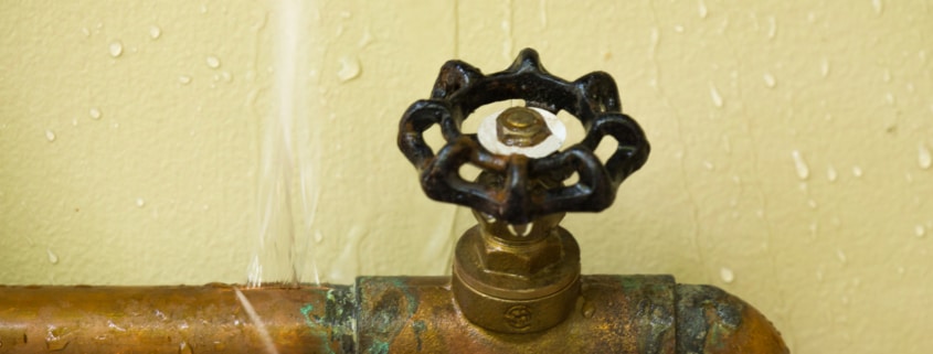 water streams from burst pipes after freezing